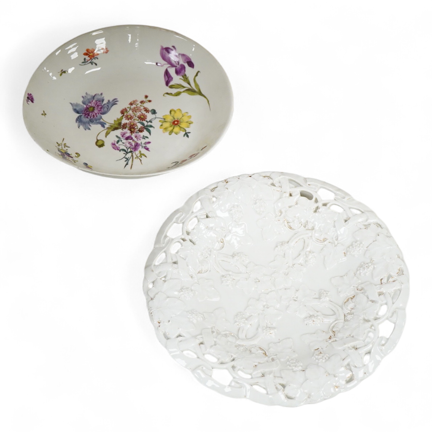 An 18th century Meissen flower painted dish, 24cm in diameter and a 19th-century Meissen moulded dish depicting grapevines